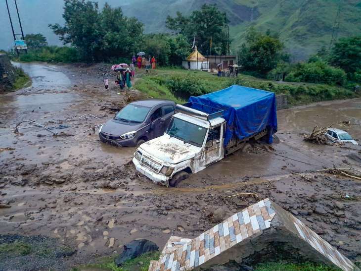 Shimla: Vehicles stuck in debris after a cloudburst at