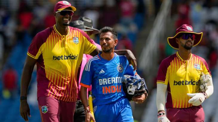 Yuzvendra Chahal and Jason Holder during the first T20I on