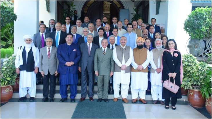 Outgoing Pakistan Prime Minister Shehbaz Sharif with his