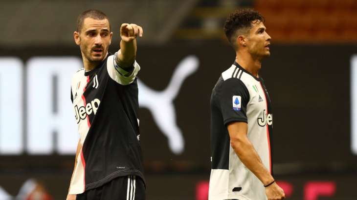 Leonardo Bonucci and Cristiano Ronaldo during AC Milan game