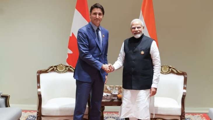 Canadian PM Justin Trudeau (right) with Indian counterpart