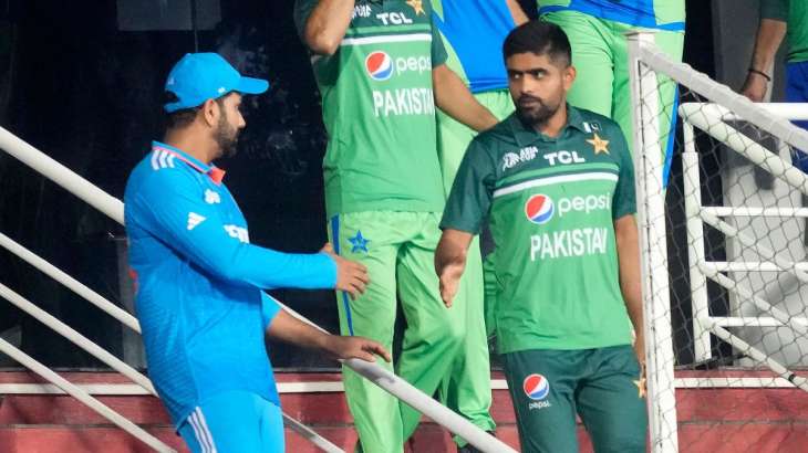 Rohit Sharma and Babar Azam shake hands after