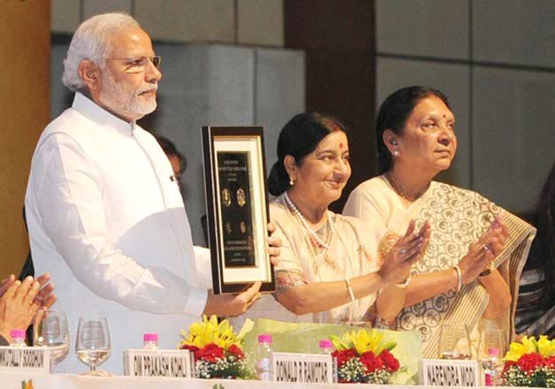 coins stamps released to mark 100 yrs of gandhi s return