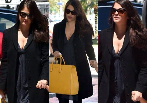 Aishwarya spotted in cleavage-revealing outfit at Cannes airport (see ...