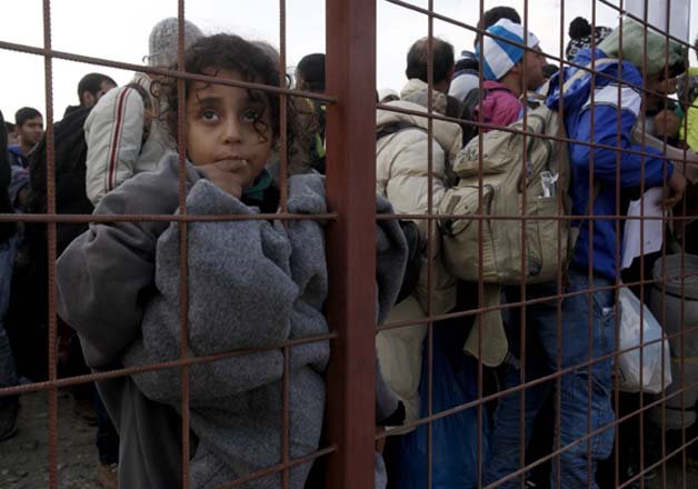 poland backs away from agreement on refugees after paris attacks