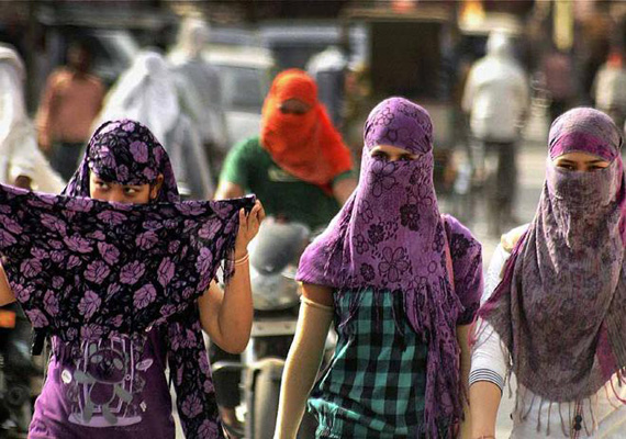 delhi wakes up to another hot day