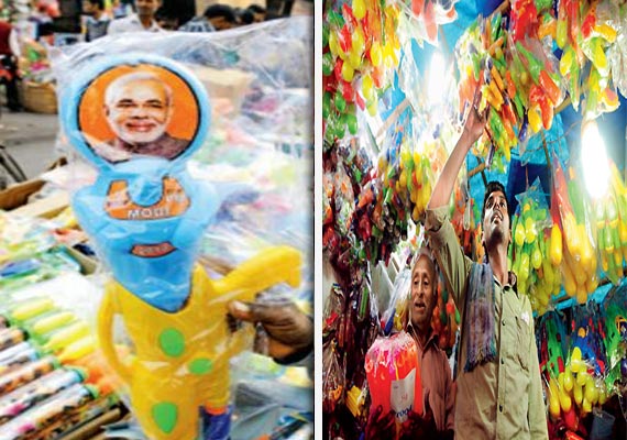 modi kejriwal pichkari battle hots up before holi modi kejriwal pichkari battle hots up before holi