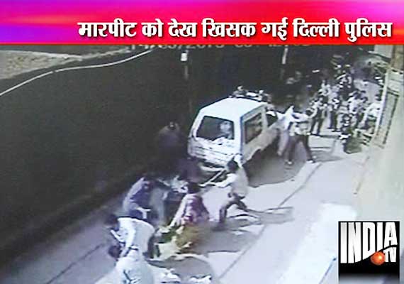 watch footage of ruffians beating up women in delhi as police pcr van vanishes from the spot
