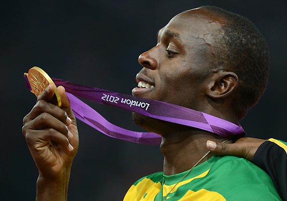 bolt gets another golden triple with relay win bolt gets another golden triple with relay win