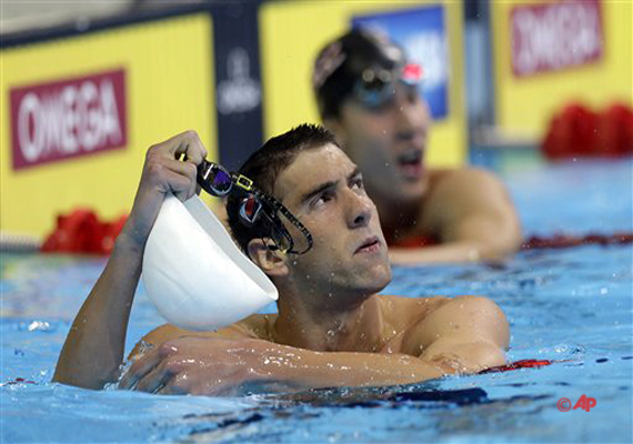 fire alarm awakens phelps from nap