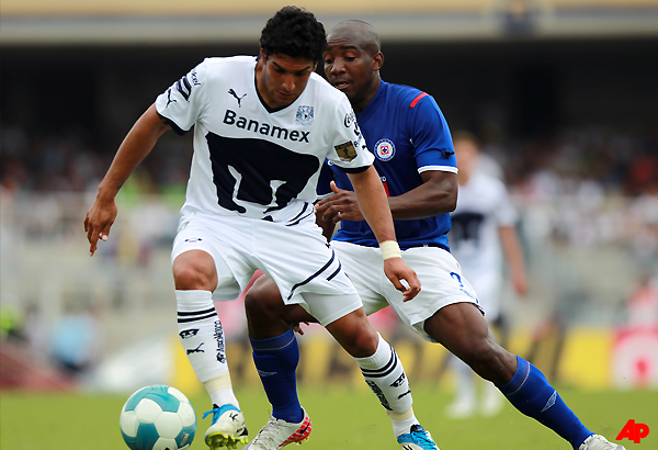 America's Michael Arroyo, celebrates after scoring against Tigres