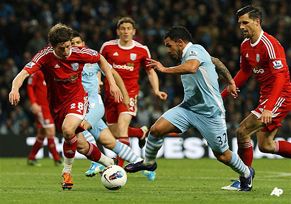 tevez scores 3 as man city beats norwich 6 1