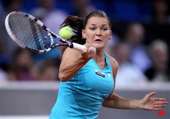 radwanska advances to 3rd round at madrid open