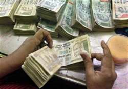 fitch renews warning on india s outlook rupee falls