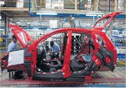 ford follows tata motors to gujarat