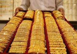 gold down by rs 100 on weak global cues silver recovers