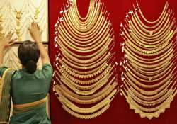 gold jumps on heavy stockists buying seasonal demand weighs