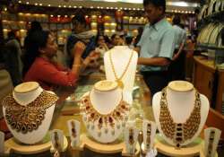 gold gains on wedding season silver sheds rs. 500