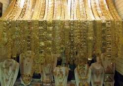 gold declines by rs 55 silver gains rs 500