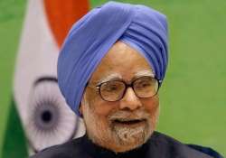 govt trying to protect indian economy from global mess manmohan