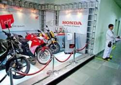 hmsi to launch 4 two wheeler models in four months