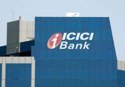 icici bank caps free transactions at own atms at five