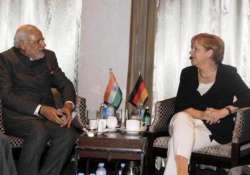 modi merkel seek to give economic muscle to indo german ties