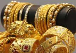 gold declines on weak global cues low demand