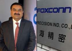 adani may make iphones in india in talks to form jv with foxconn