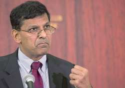 rbi governor rajan backs aadhaar cards seeks more clarity after suprme court ruling