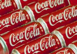 coca cola to cut 1 800 jobs globally