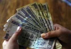 rupee fall may inflate india inc s foreign loan bill by 2 bn