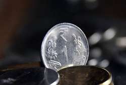 rupee ends flat at 52.54/55 vs dollar