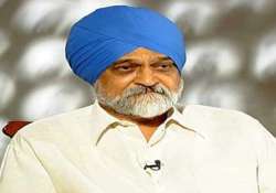 worst is over for rupee 60 65 per dollar fair value montek singh ahluwalia