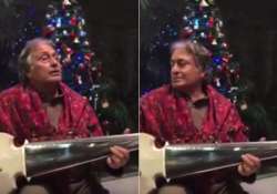 watch ustad amjad ali khan spills magic plays jingle bells on sarod