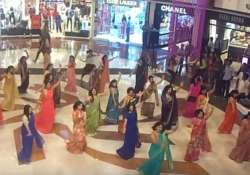 watch video women in flash mob show actresses how to dance wearing sarees