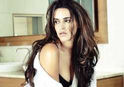 neha dhupia turns film producer