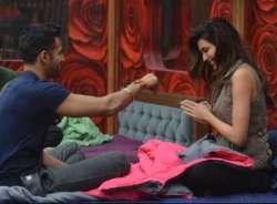 bigg boss halla bol karishma tanna kisses upen patel see pics