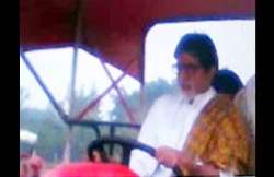 big b rides a tractor