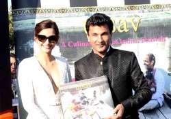 sonam kapoor unveils vikas khanna s book at cannes