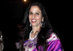 shobhaa de faces ire of shiv sena protests outside her home