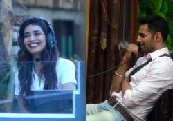 bigg boss 8 halla bol day 8 upen gets romantic with karishma during a task see pics