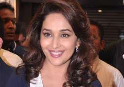 madhuri dixit rescues seven puppies