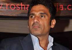 defamation case suniel shetty to pay rs 20k for non appearance