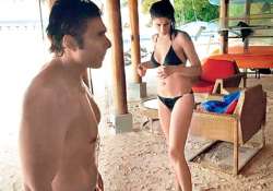 bikini clad nargis fakhri and shirtless uday chopra spotted in maldives see pics