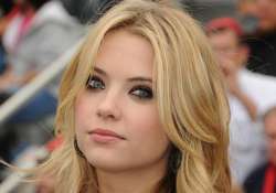 ashley benson laughs off romance rumours