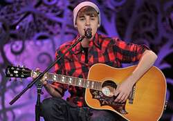 bieber pens emotional song about split