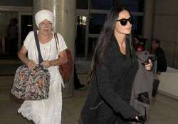 demi moore back home with spiritual guru