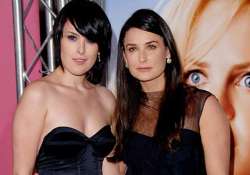 demi moore gifts gun shaped b day cake to rumer