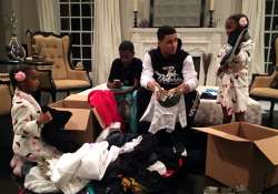 diddy combs children help typhoon victims